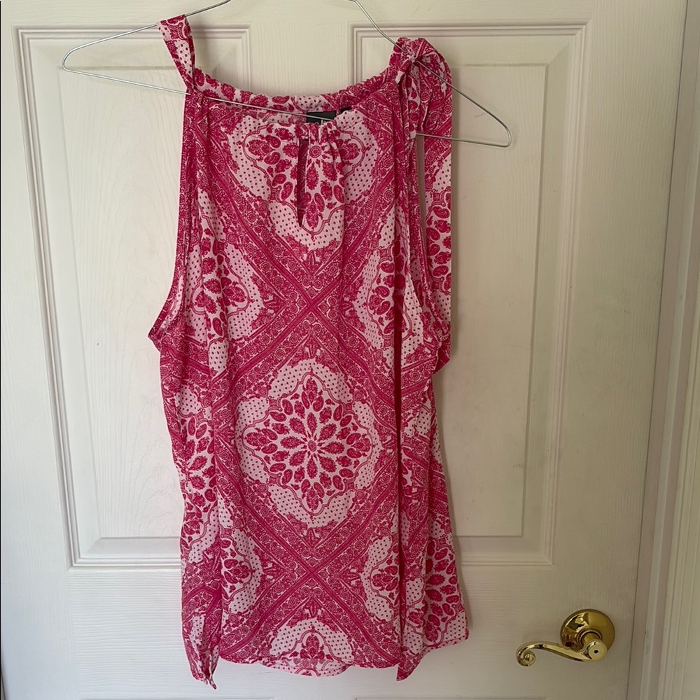Pink and white patterned blouse